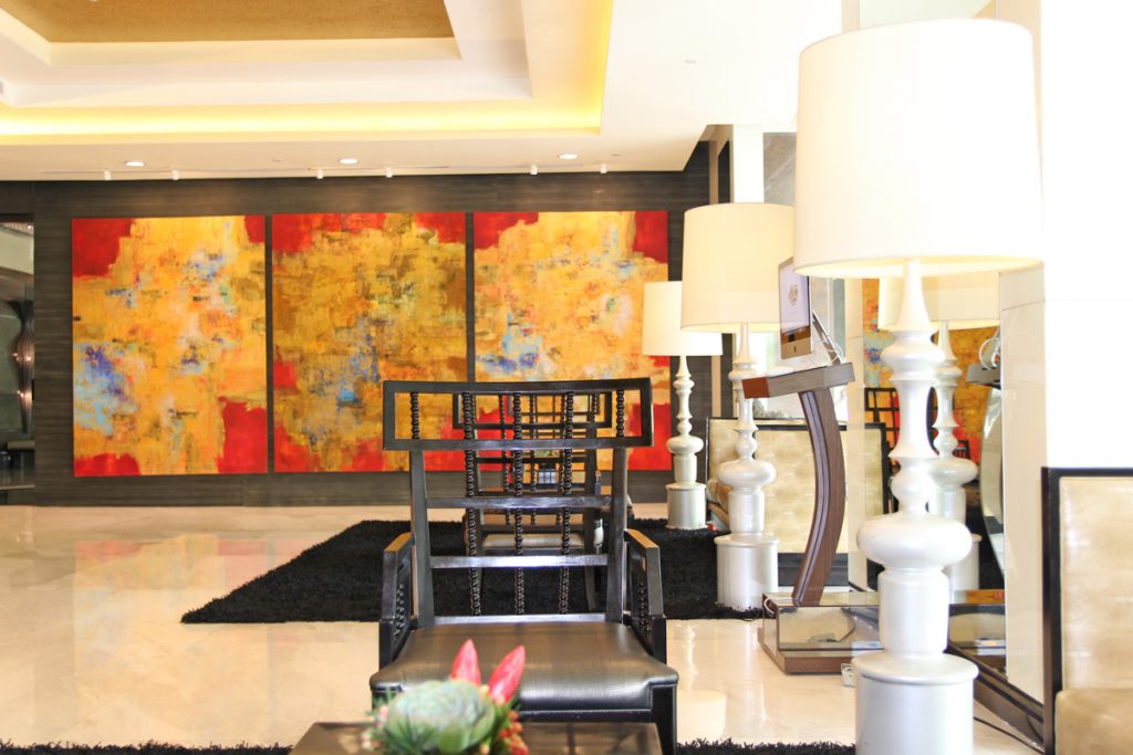 lobby of the bellevue hotel manila with painting best hotel in alabang