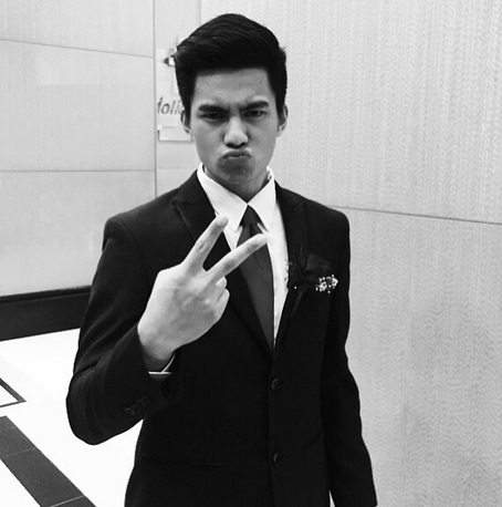 anjo damiles in a suit