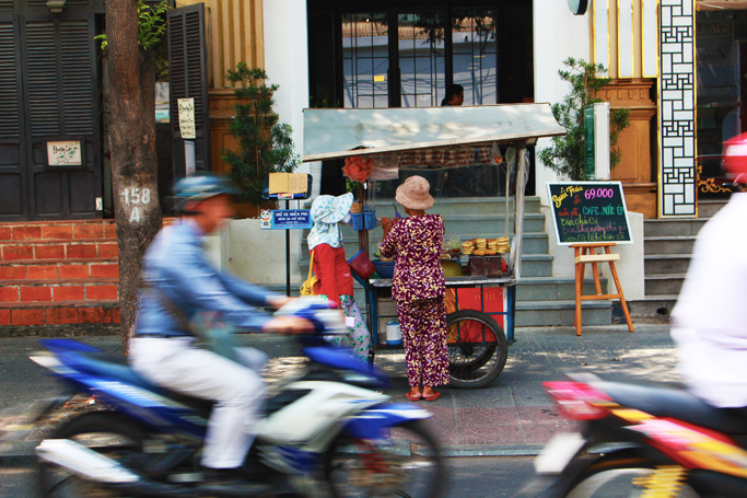 bikes side walk vendors in ho chi minh city vietnam