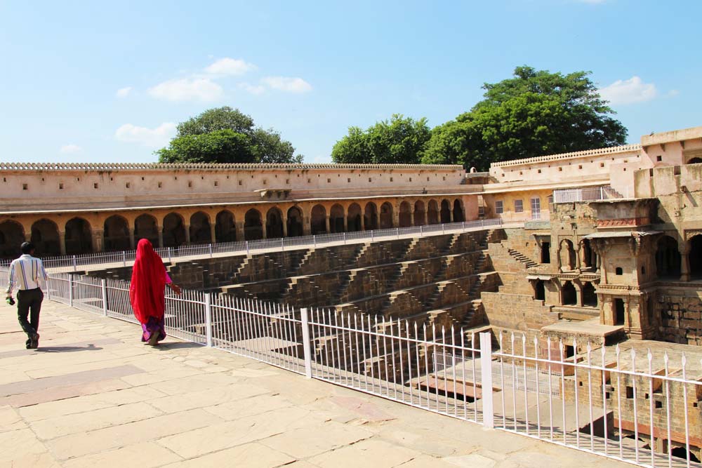 chand-baori-ancient-stepwell-side-ancient-india-jaipur-rajasthan-people-face-of-indian-batman-film-location-hindu-carving